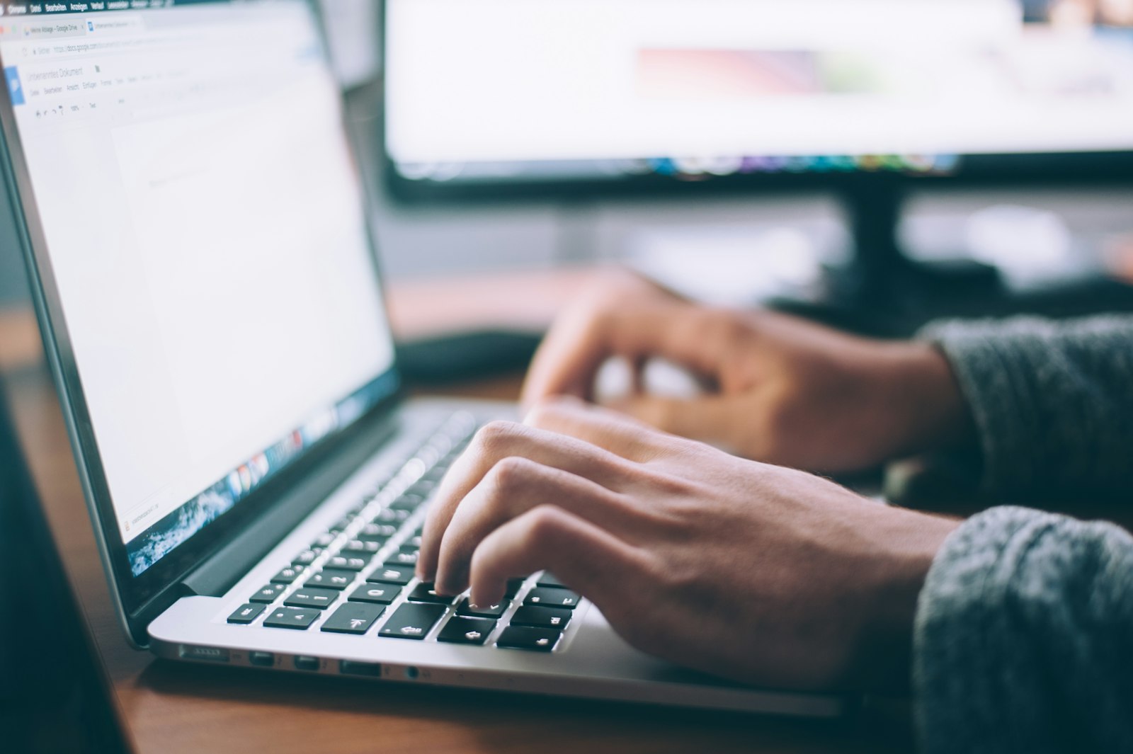 Contributor working from a laptop at home