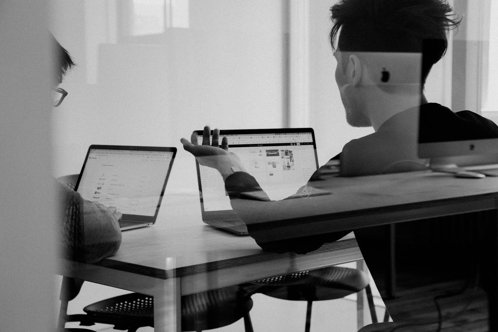 Reviewer checking quality on a laptop